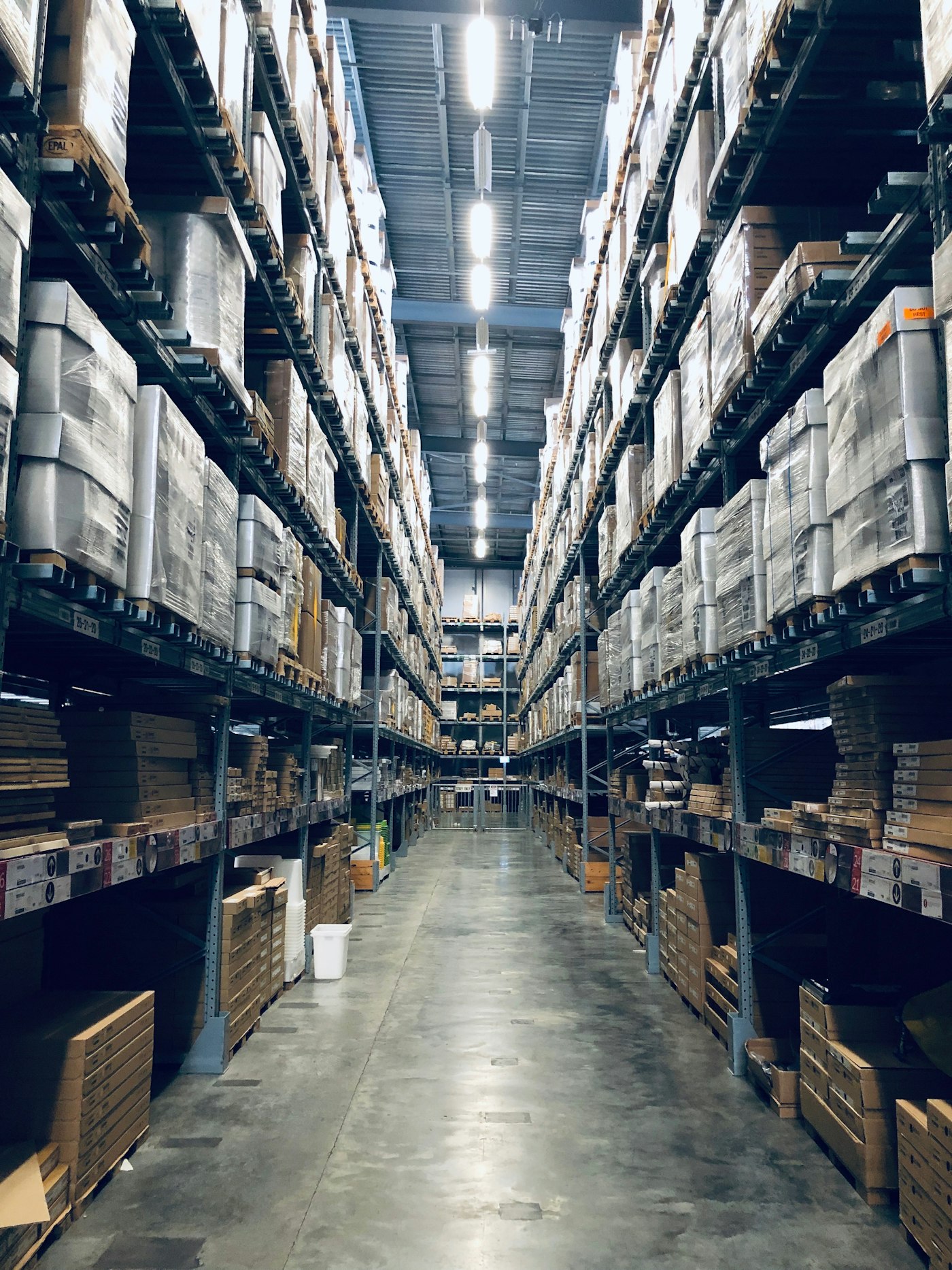 Warehouse aisle stocked with industrial supplies